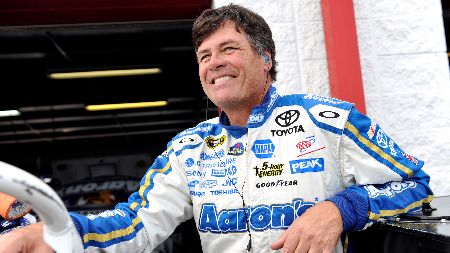 Michael Waltrip in a blue jacket caught on the camera.